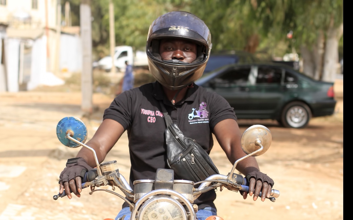 A delivery rider on his motorbike